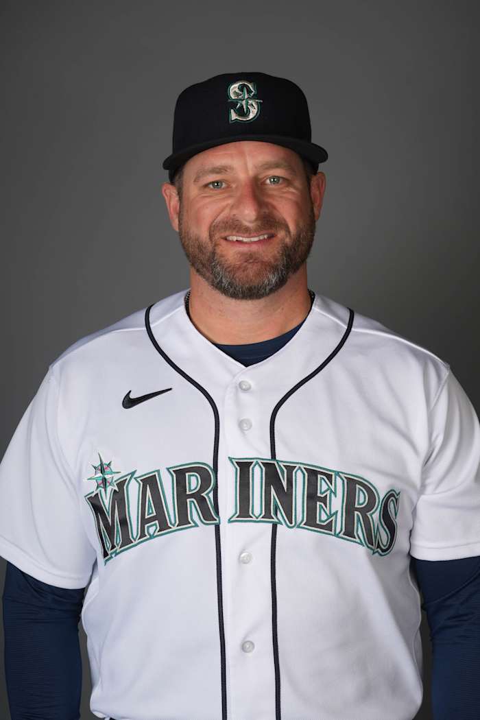 Feb 23, 2023; Peoria, AZ, USA; Seattle Mariners bullpen coach and quality control coach Stephen Vogt (13) poses during Photo Day at Peoria Sports Complex.